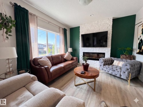 2763 Collins Crescent, Edmonton, AB - Indoor Photo Showing Living Room With Fireplace
