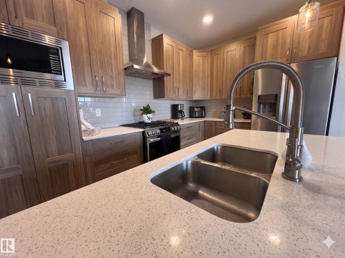 2763 Collins Crescent, Edmonton, AB - Indoor Photo Showing Kitchen With Double Sink