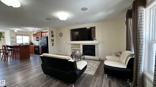 6074 Stanton Drive, Edmonton, AB - Indoor Photo Showing Living Room With Fireplace