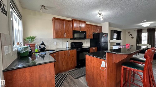 6074 Stanton Drive, Edmonton, AB - Indoor Photo Showing Kitchen With Double Sink