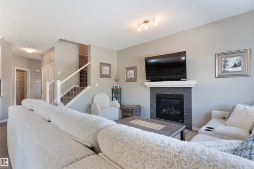 6006 19A Avenue, Edmonton, AB - Indoor Photo Showing Living Room With Fireplace