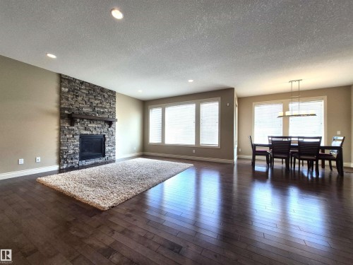 2121 90A Street, Edmonton, AB - Indoor Photo Showing Living Room With Fireplace