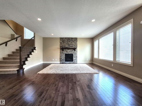 2121 90A Street, Edmonton, AB - Indoor Photo Showing Other Room With Fireplace