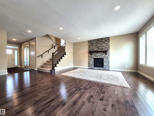 2121 90A Street, Edmonton, AB - Indoor Photo Showing Living Room With Fireplace