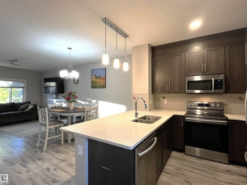 729 Berg Loop, Leduc, AB - Indoor Photo Showing Kitchen With Double Sink With Upgraded Kitchen