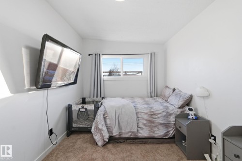 8043 135 Avenue, Edmonton, AB - Indoor Photo Showing Bedroom