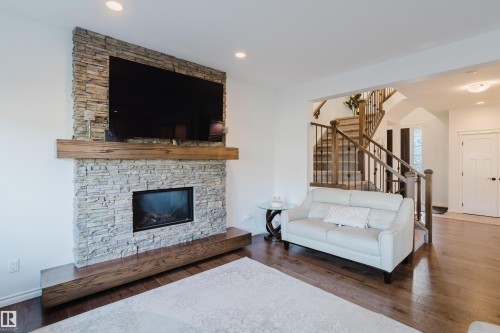 17539 61 Street, Edmonton, AB - Indoor Photo Showing Living Room With Fireplace