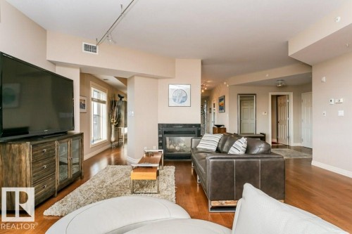 504 10108 125 Street, Edmonton, AB - Indoor Photo Showing Living Room With Fireplace