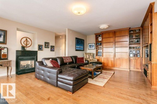 504 10108 125 Street, Edmonton, AB - Indoor Photo Showing Living Room With Fireplace