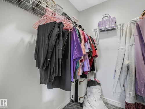 The property features a closet with white wire shelving and a hanging rod, providing storage solutions - 2636 192 Street, Edmonton, AB - Indoor With Storage