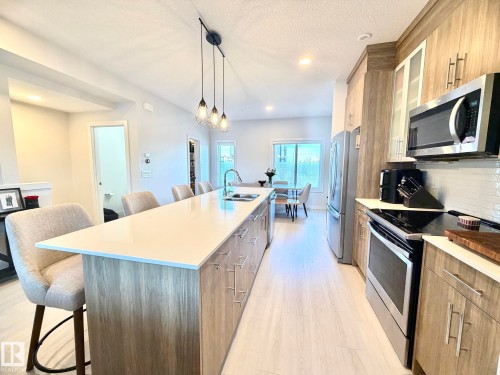 2 1010 Rabbit Hill Road, Edmonton, AB - Indoor Photo Showing Kitchen With Double Sink