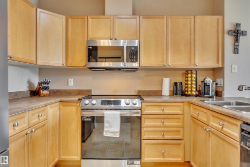 211 226 Macewan Road, Edmonton, AB - Indoor Photo Showing Kitchen With Double Sink