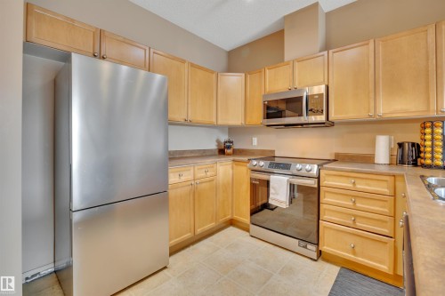 211 226 Macewan Road, Edmonton, AB - Indoor Photo Showing Kitchen