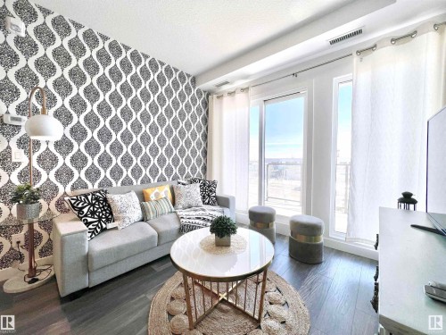 319 1316 Windermere Way, Edmonton, AB - Indoor Photo Showing Living Room
