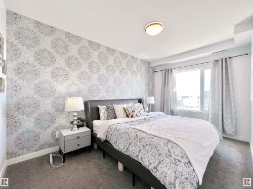 319 1316 Windermere Way, Edmonton, AB - Indoor Photo Showing Bedroom