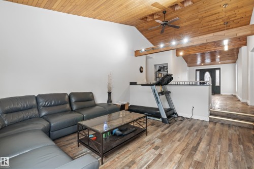 Living area featuring vaulted wood ceilings, a ceiling fan, and recessed lighting - 101 Westridge Road, Edmonton, AB - Indoor