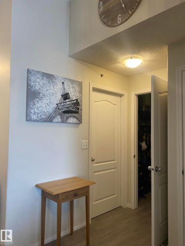 This interior features light-colored walls and flooring, with white doors and trim - 336 9525 162 Avenue, Edmonton, AB - Indoor Photo Showing Other Room