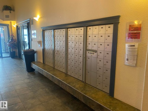 Mailboxes with individual compartments are present within the property - 336 9525 162 Avenue, Edmonton, AB - Indoor Photo Showing Other Room