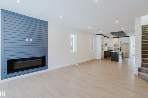 9707 157 St Nw, Edmonton, AB - Indoor Photo Showing Living Room With Fireplace