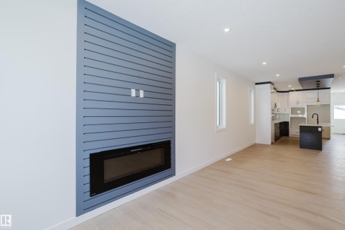 9707 157 St Nw, Edmonton, AB - Indoor Photo Showing Living Room With Fireplace