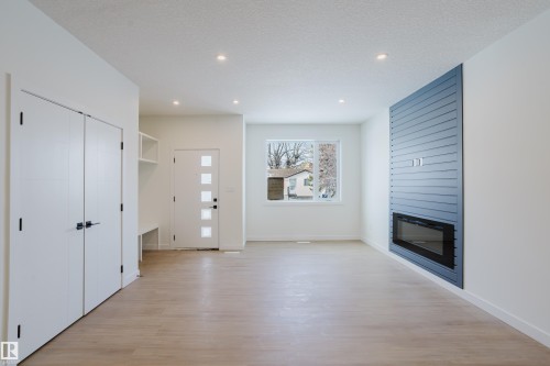 9707 157 St Nw, Edmonton, AB - Indoor Photo Showing Living Room With Fireplace