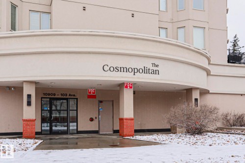 The property features a grand entrance with a curved awning and prominent building signage - 201 10909 103 Avenue Nw, Edmonton, AB - Outdoor