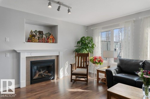 7 Erin Close, St. Albert, AB - Indoor Photo Showing Living Room With Fireplace