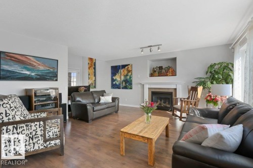 7 Erin Close, St. Albert, AB - Indoor Photo Showing Living Room With Fireplace