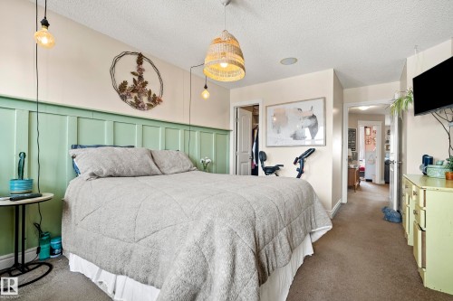 114 Mclaughlin Drive, Spruce Grove, AB - Indoor Photo Showing Bedroom