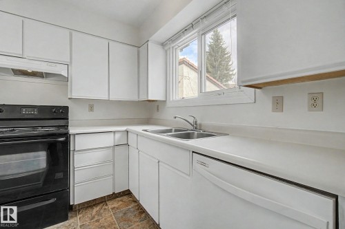 2932 36 Street, Edmonton, AB - Indoor Photo Showing Kitchen With Double Sink
