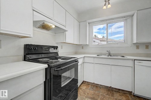 2932 36 Street, Edmonton, AB - Indoor Photo Showing Kitchen With Double Sink