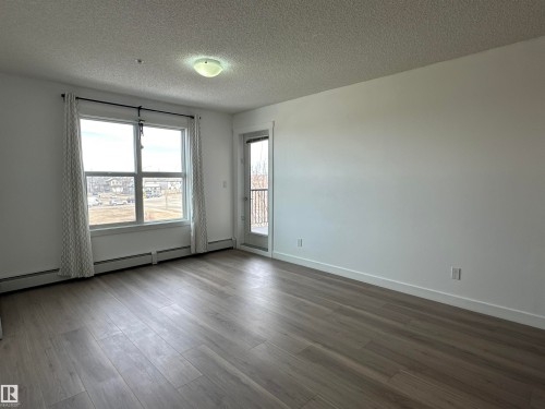 311 667 Watt Boulevard, Edmonton, AB - Indoor Photo Showing Other Room