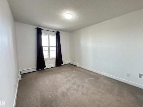 311 667 Watt Boulevard, Edmonton, AB - Indoor Photo Showing Other Room