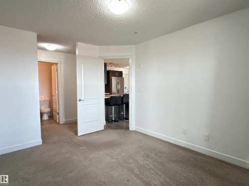 311 667 Watt Boulevard, Edmonton, AB - Indoor Photo Showing Other Room