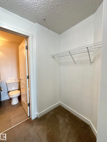 311 667 Watt Boulevard, Edmonton, AB - Indoor With Storage