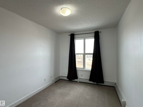 311 667 Watt Boulevard, Edmonton, AB - Indoor Photo Showing Other Room