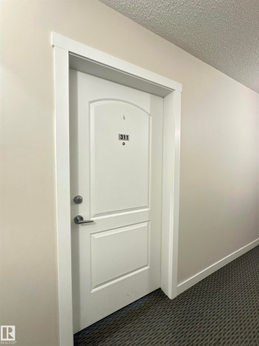 311 667 Watt Boulevard, Edmonton, AB - Indoor Photo Showing Other Room