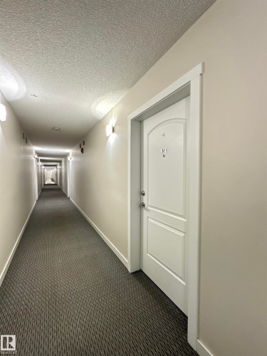 311 667 Watt Boulevard, Edmonton, AB - Indoor Photo Showing Other Room