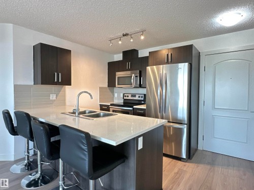 311 667 Watt Boulevard, Edmonton, AB - Indoor Photo Showing Kitchen With Double Sink With Upgraded Kitchen