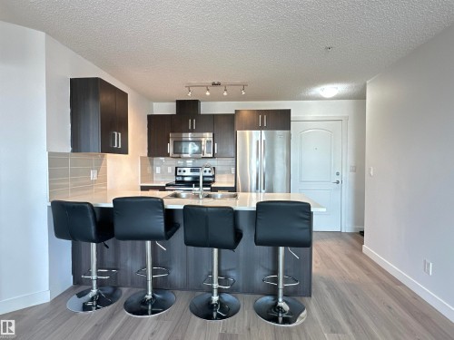 311 667 Watt Boulevard, Edmonton, AB - Indoor Photo Showing Kitchen With Upgraded Kitchen