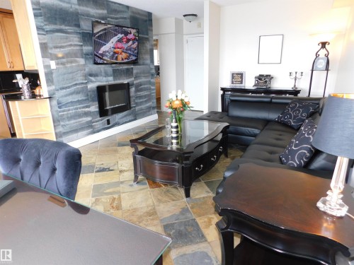 1704 10150 117 Street, Edmonton, AB - Indoor Photo Showing Living Room With Fireplace