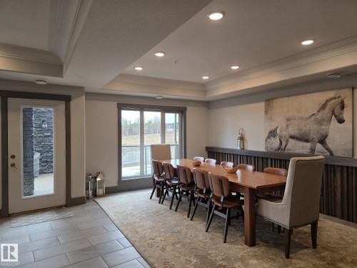 The property features a dining area with recessed lighting and crown molding - 304 5201 Brougham Drive, Drayton Valley, AB - Indoor Photo Showing Dining Room