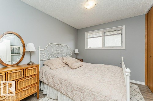 This room features a window providing natural light, light grey walls, and a light-colored ceiling - 8 Duke Drive, Lamont, AB - Indoor Photo Showing Bedroom