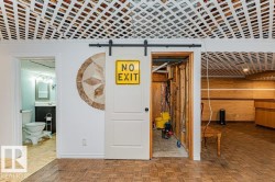 This space features parquet wood flooring and a distinctive lattice ceiling - 