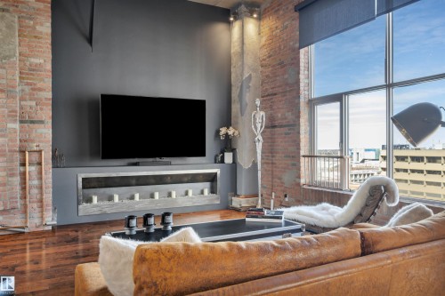 1004 10179 105 Street, Edmonton, AB - Indoor Photo Showing Living Room With Fireplace