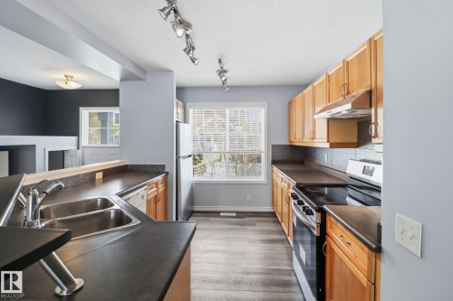36 3075 Trelle Crescent, Edmonton, AB - Indoor Photo Showing Kitchen With Double Sink