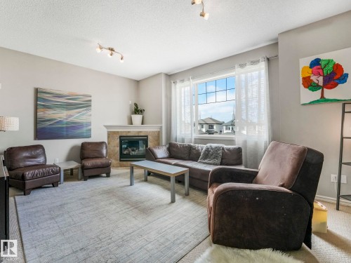 2354 Taylor Close, Edmonton, AB - Indoor Photo Showing Living Room With Fireplace
