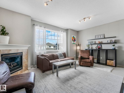 2354 Taylor Close, Edmonton, AB - Indoor Photo Showing Living Room With Fireplace