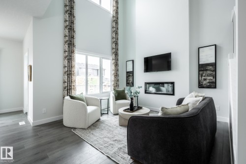 60 Lemon Close, Spruce Grove, AB - Indoor Photo Showing Living Room With Fireplace