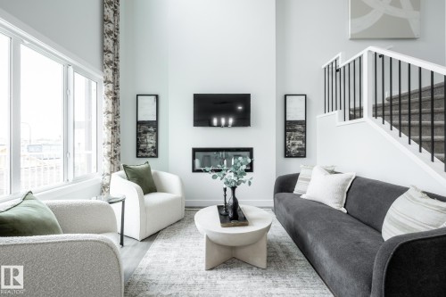 60 Lemon Close, Spruce Grove, AB - Indoor Photo Showing Living Room With Fireplace